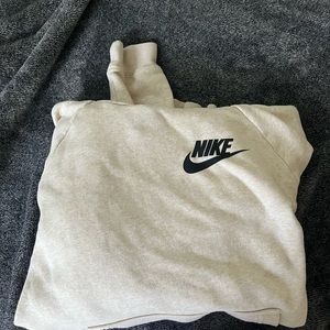 Cream colored Nike hoodie